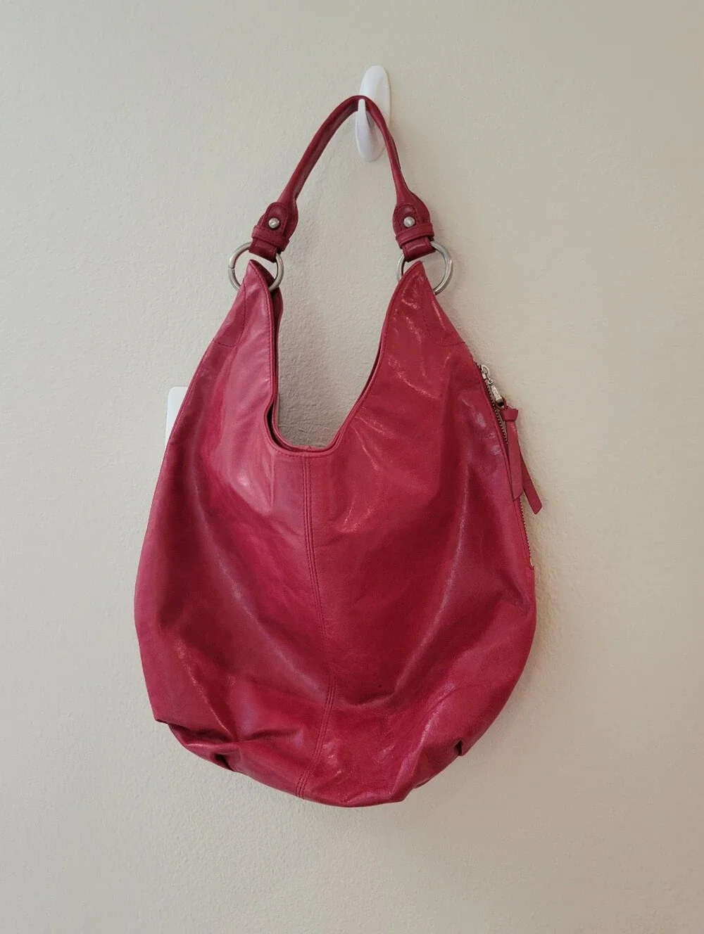 Hobo Women's Red Leather Shoulder Bag With 1 Strap, and Magnetic Close.